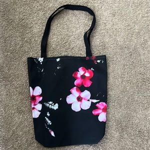 Black and pink flower tote bag.